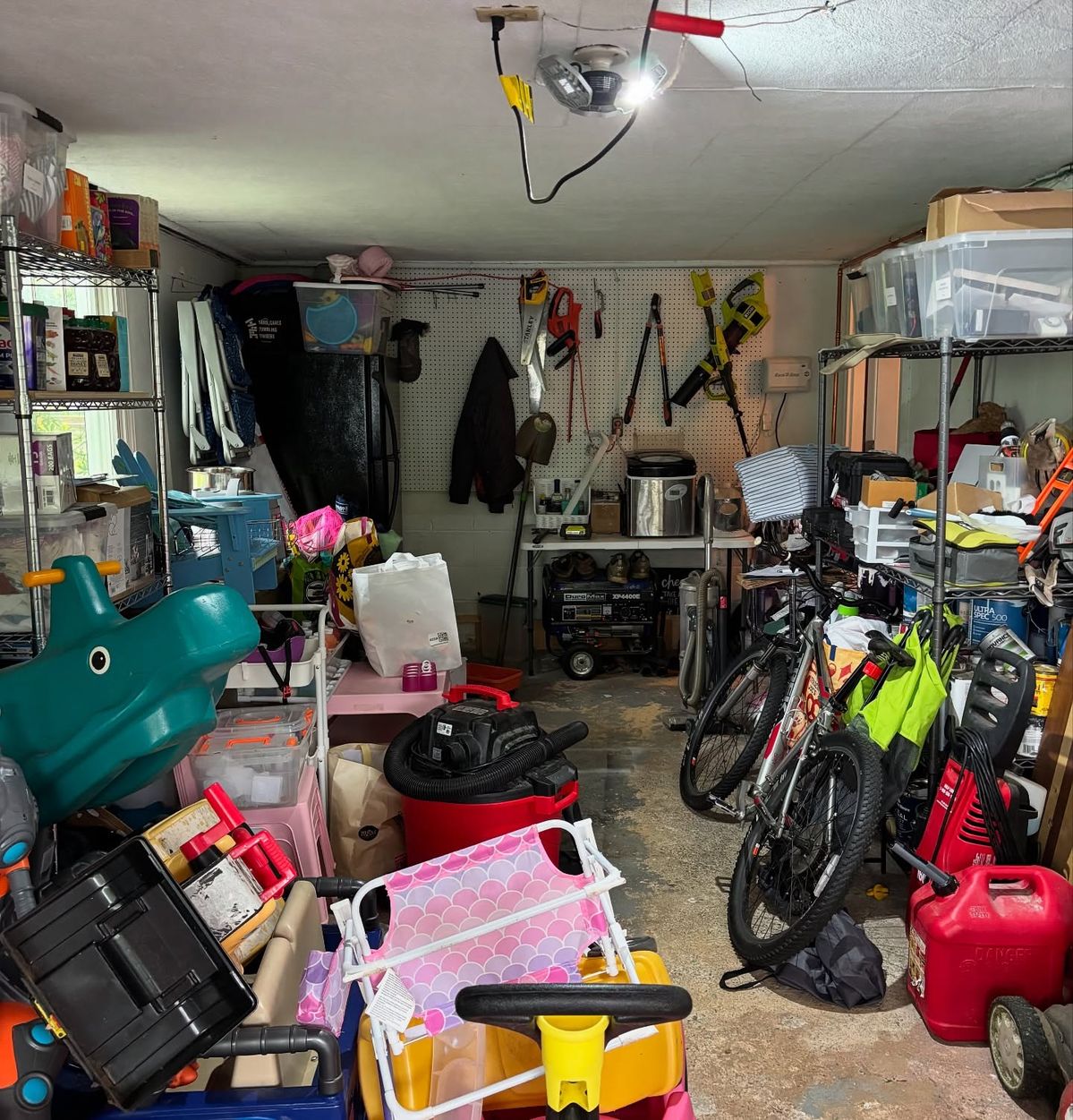 Before: Cluttered garage needing cleaning